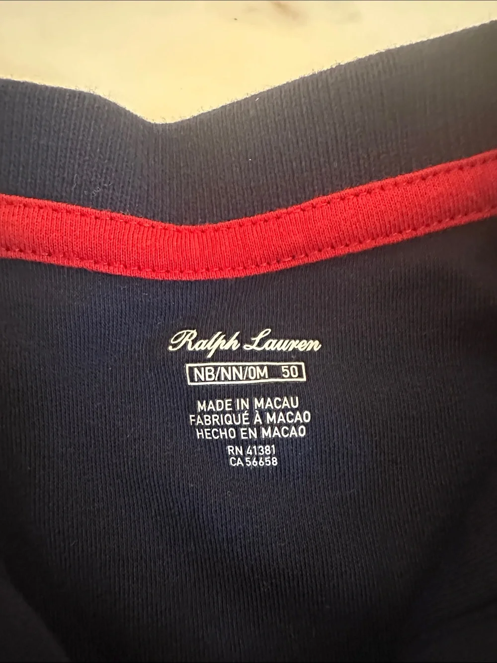 Ralph Lauren Navy Polo Romper with Multicolor Pony Embroidery- newborn